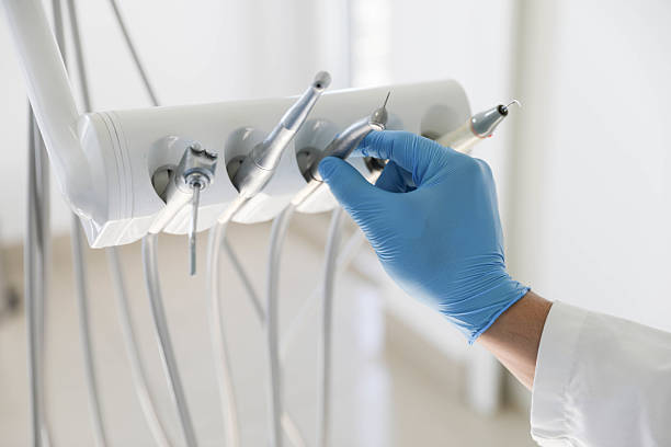 Professional Emergency Dentist technician working in Frostproof, FL